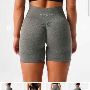 NVGTN khaki green scrunch shorts medium